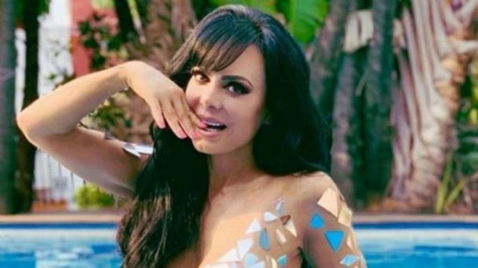 Maribel Guardia presume pierna con ceñido vestido morado de primavera