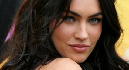 Megan Fox luce fabulosa en estos vestidos negro y dorado con un revelador escote