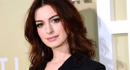 Anne Hathaway roba suspiros con vestido transparente de Valentino y guantes de cuero